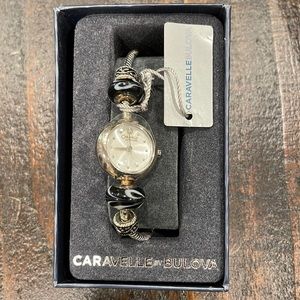 Caravelle by Bulova 43L141 Women's Round White Analog Black Beads Lacquer Watch